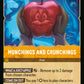 (033/204) Lorcana Whispers in the Well Single: Munchings and Crunchings Holo Common